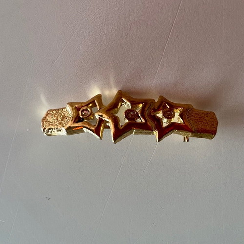Small pin used with three stars and rhinestones gold plated