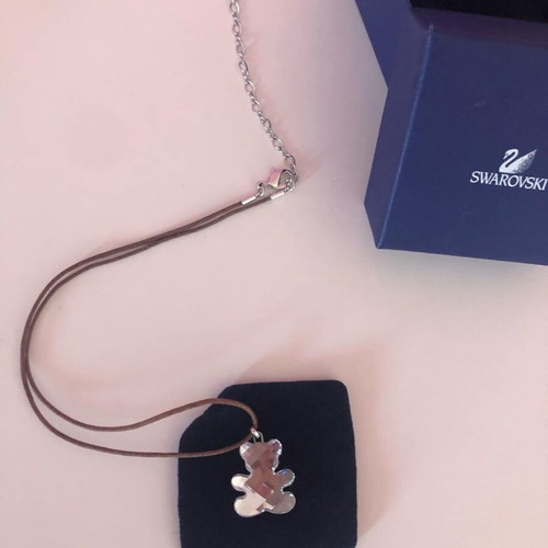 Swarovski bear necklace new with brown leather strap