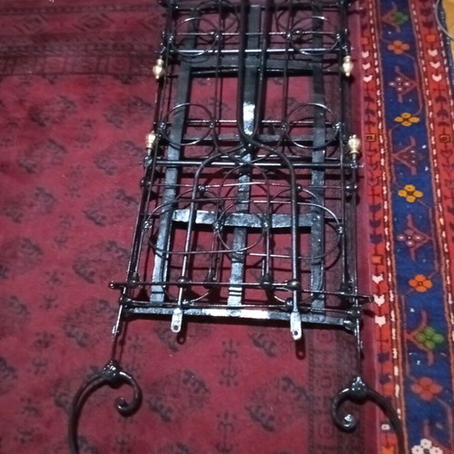 Baby cradle old handmade iron with bronze details refurbished