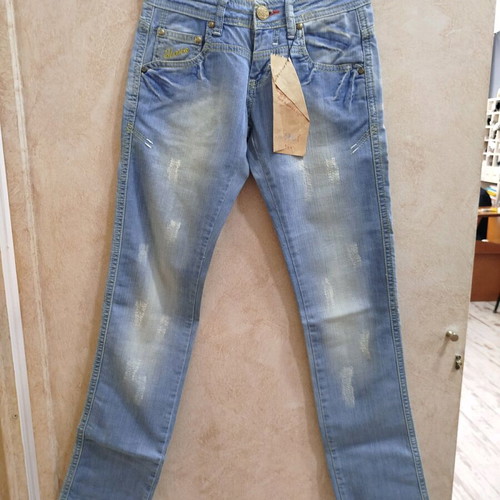 Jeans like new, low rise, light blue with yellow fading, slim fit