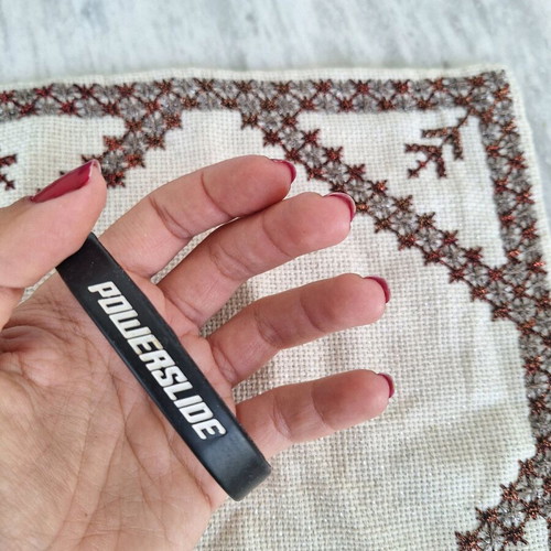 Black elastic rubber bracelet with letters used