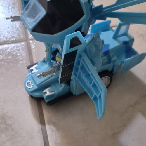 Electronic airplane transforming into robot toy