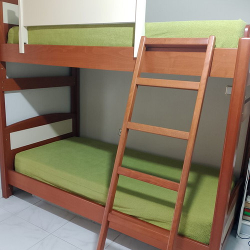 Bunk bed with mattresses used, children's room