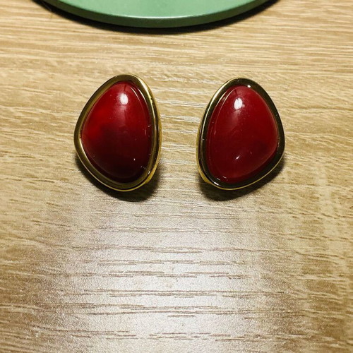 Vintage style earrings with deep red and gold trim