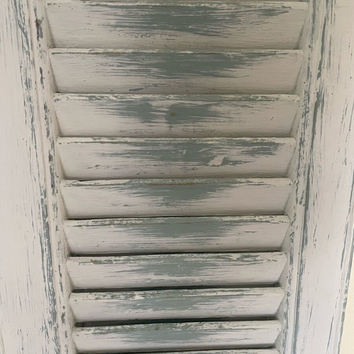 Decorative wooden shutter refurbished with chalk paint colors