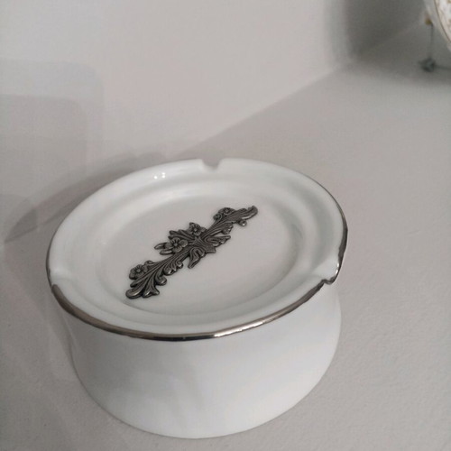 Porcelain ashtray unused with pewter decoration