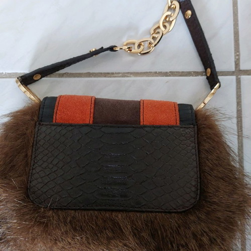 Handbag new with synthetic brown fur and croco print