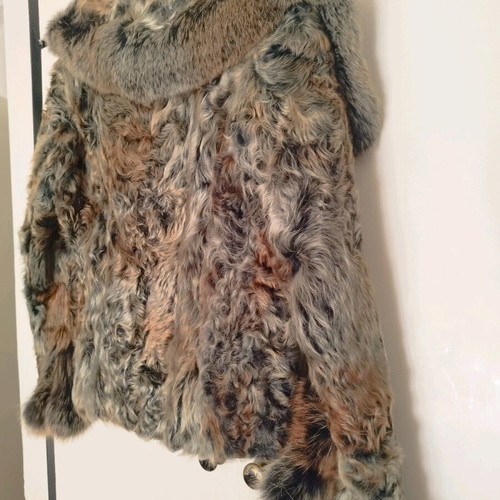 Diversi natural fur size 38 like new