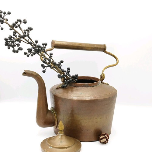 Vintage copper hand-forged teapot used with brass elements