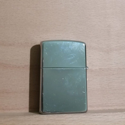 Zippo lighter used with appliqué leather decoration