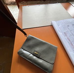 Hand wallet used, leather gray with multiple compartments
