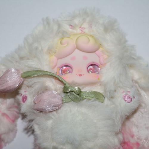 Plush doll baby miniature with flower