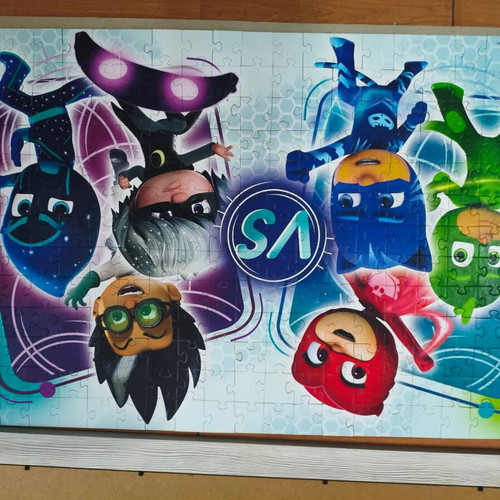 Children's puzzle in frame with extra puzzle