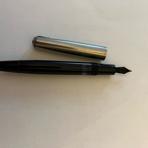 Pen with 14kt gold nib old used with piston
