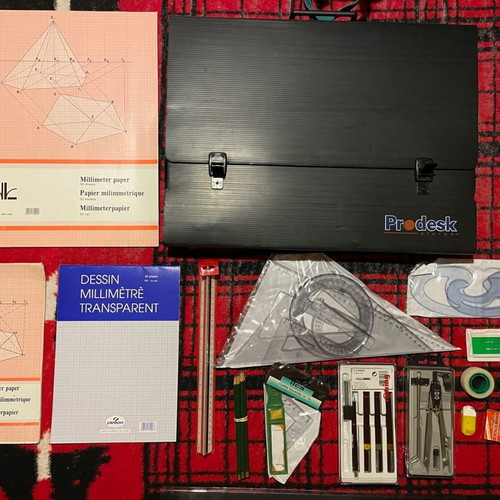 Professional drawing set used with tools and papers