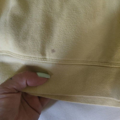 H&M sweatshirt used, yellow, size M with small stain