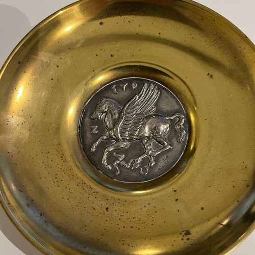Decorative brass plate with silver Pegasus inlay used