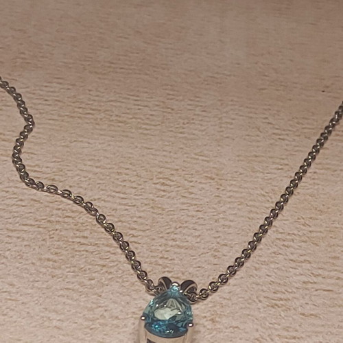 Women's necklace with blue gemstone