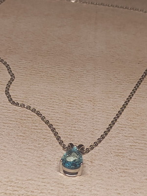 Women's necklace with blue gemstone