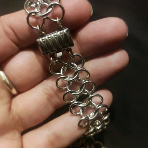 Metal necklace with a unique weave
