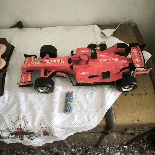 Formula 1 toy car with friction and sounds, red, like new