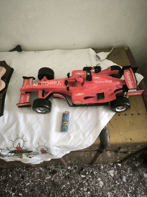 Formula 1 toy car with friction and sounds, red, like new