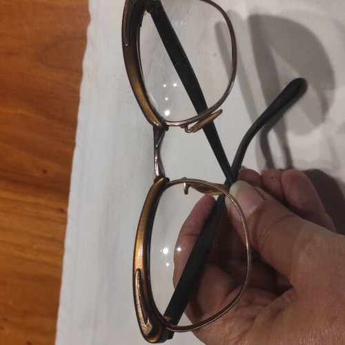 Vintage eyeglasses used, gold color with old case