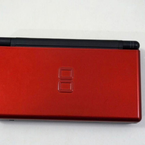 Nintendo DS Lite console used with Pokemon LeafGreen cartridge and accessories