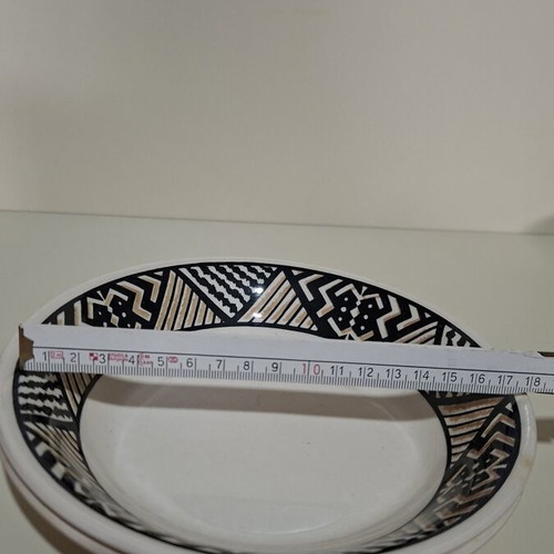 Vintage dinnerware set of 7 pieces with geometric black and brown pattern, like new