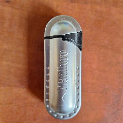 Set of 2 vintage collectible lighters, grey metal and red racing