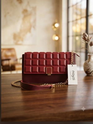 Noyzi shoulder bag with quilted texture, deep color