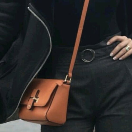 Carpisa crossbody bag used, orange with strap wear