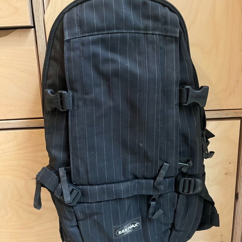 Eastpak black backpack used for office and laptop