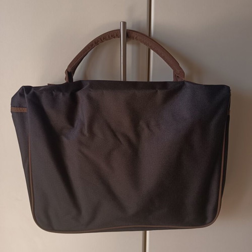 Laptop bag new, black with brown handles and zipper compartments