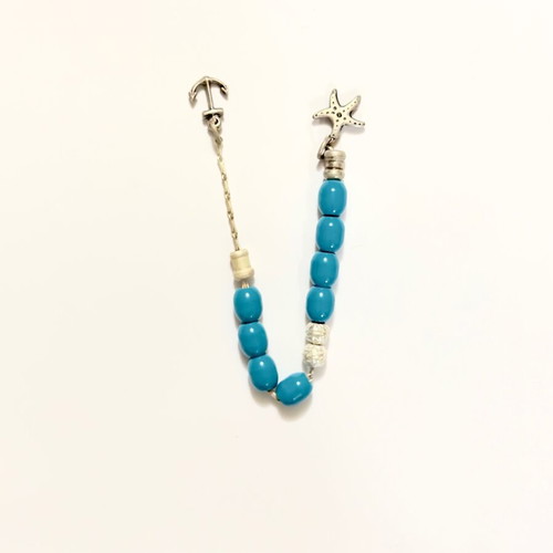 Worry beads with blue beads used, summer decorative elements