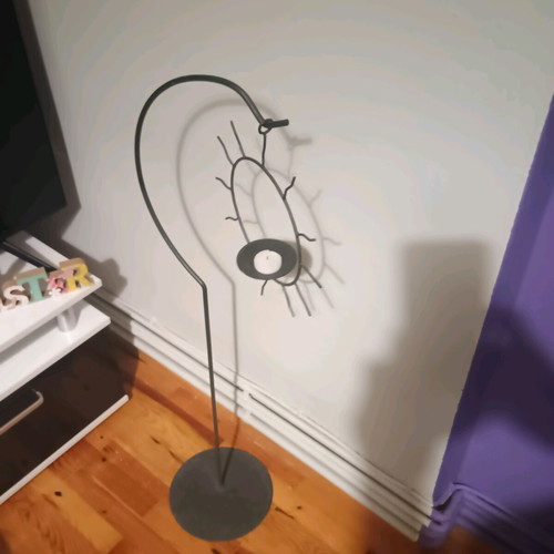 Handmade floor candlestick with hanging sun, like new, 1m height