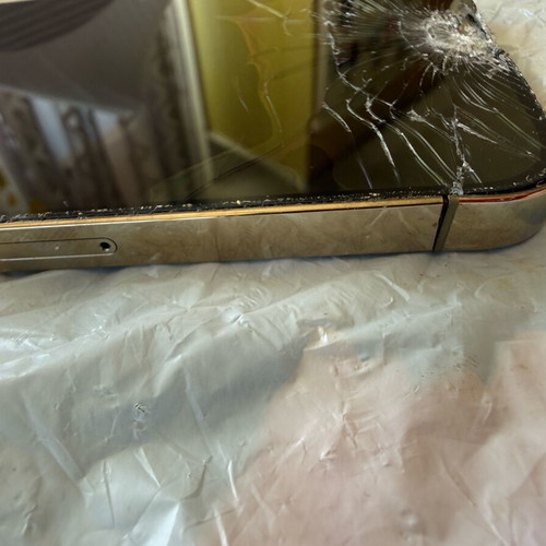 iPhone 14 Pro used with serious external damage for parts or repair