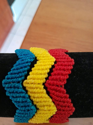 Macrame bracelets like new, red and yellow