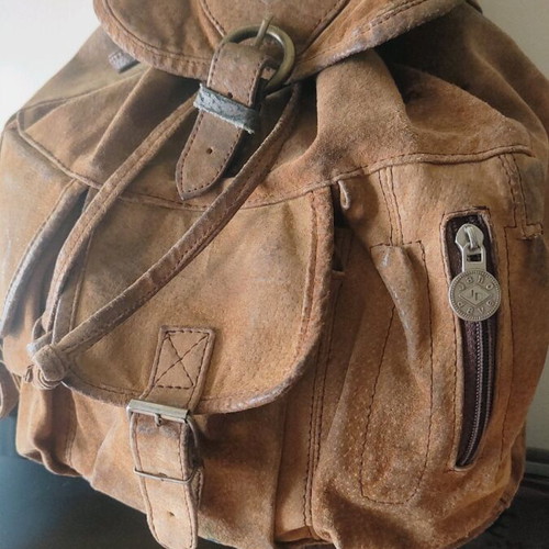 Handmade leather backpack used with adjustable straps
