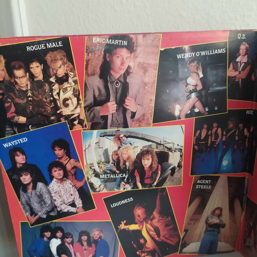 The Singles Album double vinyl used, heavy metal