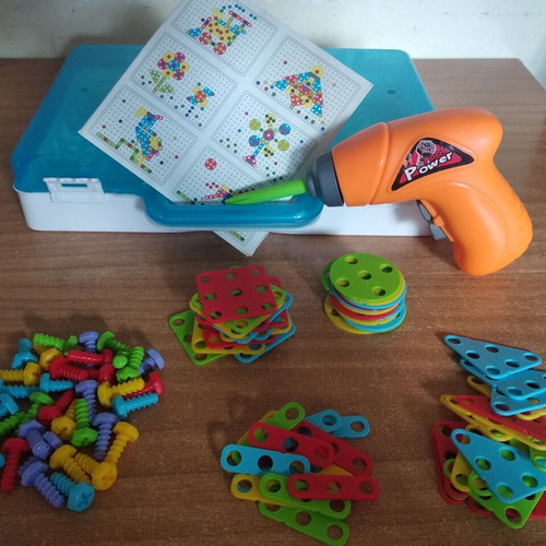 Battery-Powered Screwdriver Toy like new with shapes and screws