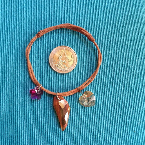 Adjustable bracelet used with brown and multicolor crystals