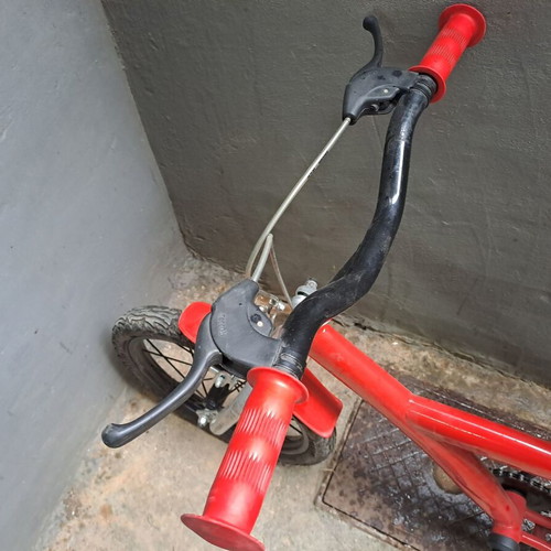 Children's bicycle used, red, saddle height approx. 60 cm