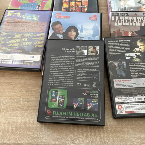 DVD pack of 8 movies including Fat Boy Slim Big Beach Boutique II and Austin Powers