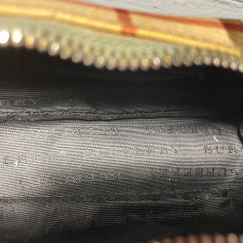Burberry luxury toiletry bag used with defects