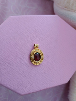 Gold motif 14 carat with garnet and diamonds new