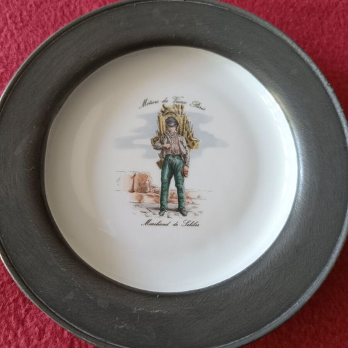 Decorative porcelain plate with pewter base like new