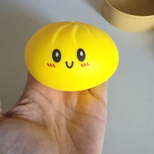 Squeeza Dumpling yellow squishy toy