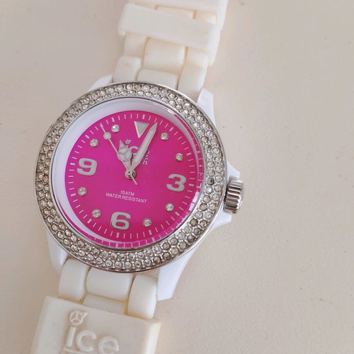 Ice Watch wristwatch used with pink dial missing 2-3 diamonds