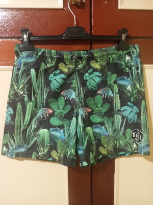 CALI kids swim shorts used, tropical reptile print, size 146 cm